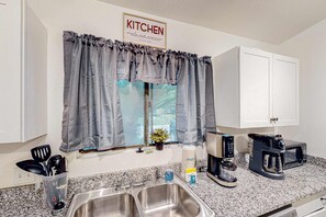 Fridge, microwave, oven, stovetop - Quiet, updated, single-story home with fenced yard - near marinas, St. Andrews (Panama City Beach)