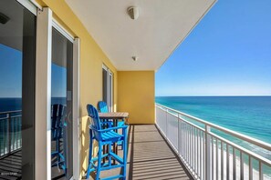 Outdoor dining - Gulf-front condo with pier views, balcony, heated pool, gym & AC (Panama City Beach)