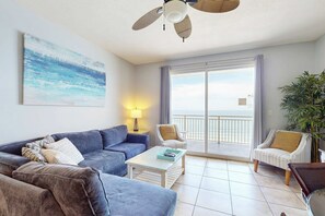TV, offices - Tropical-themed condo with bi-level pool, fitness center & beach access (Panama City Beach)