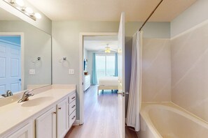 Shower, hair dryer, towels - Tropical-themed condo with bi-level pool, fitness center & beach access (Panama City Beach)