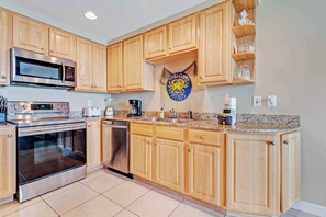 Fridge, microwave, oven, stovetop - Gulf front condo with resort amenities, snack bar, and Lazy River (Panama City Beach)
