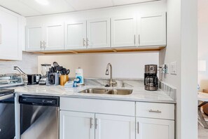 Fridge, microwave, oven, stovetop - Gulf-front condo with amazing views, WiFi, central AC, pools, & fitness room (Panama City Beach)