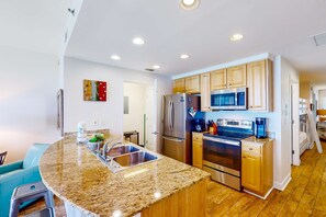 Fridge, microwave, oven, stovetop - Gulf-view escape near the beach with pool, hot tub, balcony & w/d (Panama City Beach)