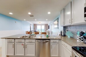 Fridge, microwave, oven, stovetop - Gulf-front condo & studio with balconies, beach views, pool, hot tub & gym (Panama City Beach)