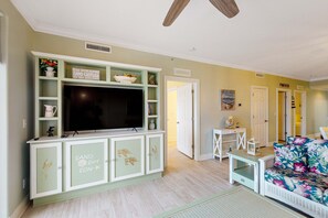 TV, offices - Snowbird friendly gulf-view condo w/ Pool  Hot tub, & Private Balcony (Panama City Beach)