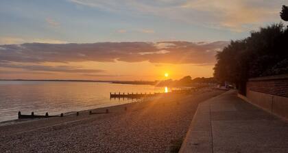 Beach opposite, panoramic sea views and a garden bar to enjoy