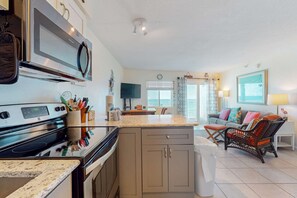 Fridge, microwave, oven, stovetop - Gulf-front condo with shared pool & gym, balcony, WiFi, & great view (Perdido Key)