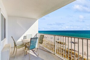 Outdoor dining - Gulf-front condo with shared pool & gym, balcony, WiFi, & great view (Perdido Key)