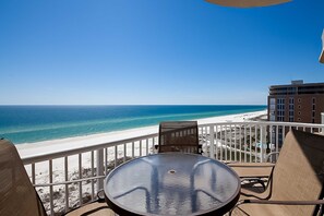 Outdoor dining - Open condo, on-site pool & hot tub, gulf-front balcony, on the beach (Perdido Key)