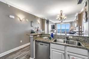 Fridge, microwave, oven, stovetop - Stunning Gulf-front condo with balcony, pool, hot tub, gym & beach views (Panama City Beach)
