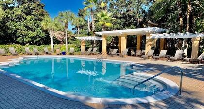 Dog-friendly townhome with golf cart, close to shops, restaurants, pools, & beach