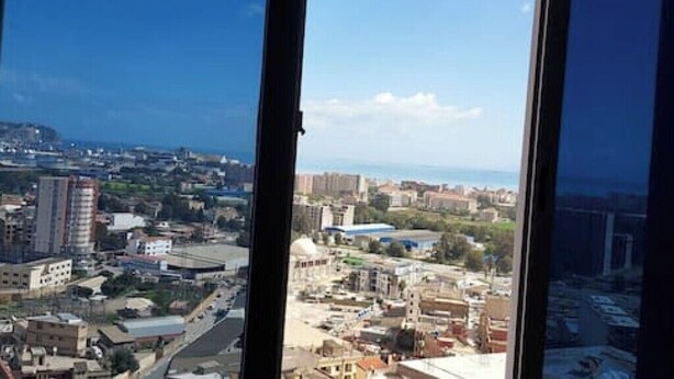A cityscape view from a high-rise building with a clear sky. - Whole house: apartment - Béjaïa, Algeria (Béjaïa)