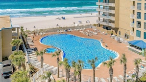 A hotel with a swimming pool, beach access, and a view of the ocean. - Gulf-Front Condo w/ 14th-Floor Views, Beach Service & Shared Pools/Hot Tubs (Panama City Beach)