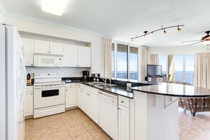 Fridge, microwave, oven, stovetop - 16th-floor waterfront condo with fast WiFi, Gulf view, pools, hot tubs, & gym (Panama City Beach)