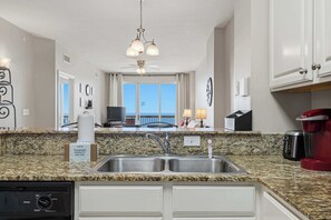Fridge, microwave, oven, stovetop - 24th-floor oceanfront condo with pool access, ocean view & W/D (Panama City Beach)