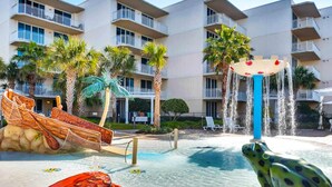 A water park with slides, a frog statue, and a pool. - 2nd Floor Waterscape Condo w Beach Access, Beach Service, Shared Amenities (Fort Walton Beach)