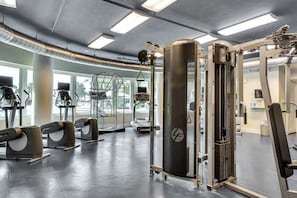 A gym with various exercise equipment, including treadmills and weight machines. - 2nd Floor Waterscape Condo w Beach Access, Beach Service, Shared Amenities (Fort Walton Beach)