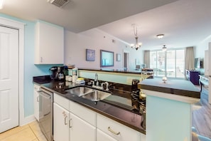 Fridge, microwave, oven, stovetop - Second floor beachfront condo with pool and hot tub access, W/D, and central AC (Fort Walton Beach)