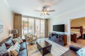 TV, offices - Second floor beachfront condo with pool and hot tub access, W/D, and central AC (Fort Walton Beach)