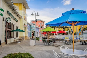 Outdoor dining - Two-story getaway with an indoor pool, patio, washer/dryer, & central AC (Panama City Beach)