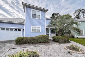 Exterior - Two-story getaway with an indoor pool, patio, washer/dryer, & central AC (Panama City Beach)