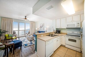 Fridge, microwave, oven, stovetop - Tropical, waterfront oasis with furnished balcony, pools, & beach access (Panama City Beach)