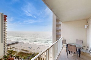 Outdoor dining - Lovely condo on Gulf with beach, pools, hot tub, & balcony (Panama City Beach)