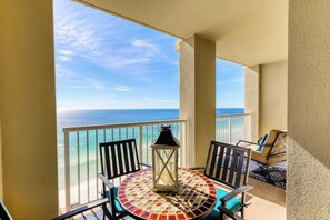 Outdoor dining - Oceanfront getaway with views, large balcony, W/D, pool & hot tub (Panama City Beach)