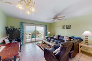 TV, offices - Summit Unit 325 | Ocean-view condo with a pool - snowbird-friendly (Panama City Beach)