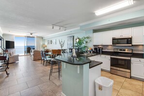 Fridge, microwave, oven, stovetop - Beachfront getaway with Gulf view, pool, hot tub, central AC & washer/dryer (Panama City Beach)