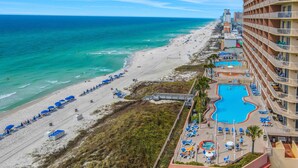 A hotel with a pool, beach, and ocean view. - Elegant & spacious condo with incredible Gulf-front views, two pools & gym (Panama City Beach)