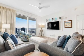 TV, offices - Pristine, waterfront condo with outdoor pool, hot tub & fitness room (Panama City Beach)