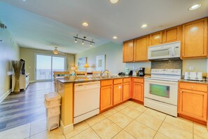 Fridge, microwave, oven, stovetop - Beachfront condo with Gulf views, access to beach, large pool, hot tub & gym (Panama City Beach)