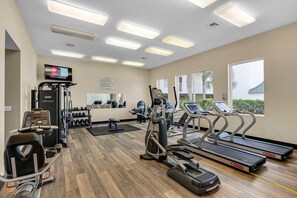 A gym with treadmills, an elliptical, and free weights. - 3rd-floor condo with sauna, gym, pool, tennis & pickleball, conference room (Santa Rosa Beach)