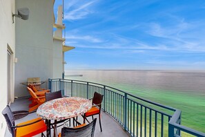 Outdoor dining - Updated beachfront retreat with hot tub, outdoor pool & balcony (Panama City Beach)