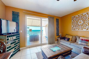 TV, offices - Colorful, waterfront condo with beach access, pool & fitness center (Panama City Beach)
