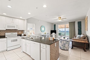 Fridge, microwave, oven, stovetop - Colorful, waterfront condo with beach access, pool & fitness center (Panama City Beach)