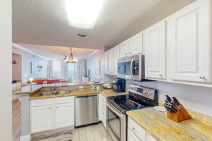 Fridge, microwave, oven, stovetop - Oceanfront condo with pools, hot tub, tennis & gym - easy beach access (Pensacola)