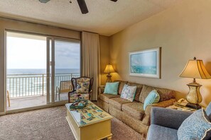 TV, offices - Artsy beach condo with amazing views, bi-level pool & gym - near the beach (Panama City Beach)