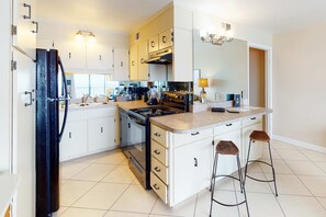 Fridge, microwave, oven, stovetop - Beachfront condo in gated resort | Pools & Hot tub (Panama City Beach)