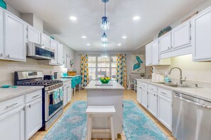 Fridge, microwave, oven, stovetop - Home with kitchen, patio, playground, central AC, & W/D (Pensacola)