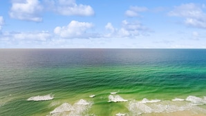 A coastal view with clear skies and calm waters. - 22nd-floor beachfront condo with Gulf views, hot tub, pools, sauna, gym, balcony (Panama City Beach)