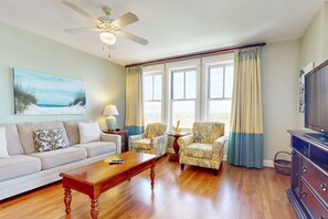 TV - Modern comfort at the Grand with on-site pool, hot tub & fitness center (Miramar Beach)