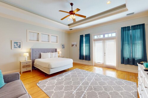 3-story, dog-friendly home with pool & balcony - walk to beach
