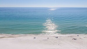A beach with a clear view of the ocean and a sandy shore. - 16th-floor oceanfront condo with ocean view, WiFi, and hot tub/pool (Panama City Beach)