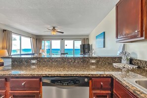 Fridge, microwave, oven, stovetop - Second-Floor Gulf Front Condo with Shared Pool & Boardwalk in the Heart of Destin (Destin)