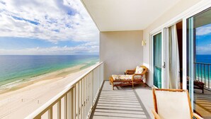 A balcony with a view of the beach and ocean. - Inviting Gulf-front condo In Perdido Key with waterfront pool/hot tub and oceanfront balcony (Perdido Key)
