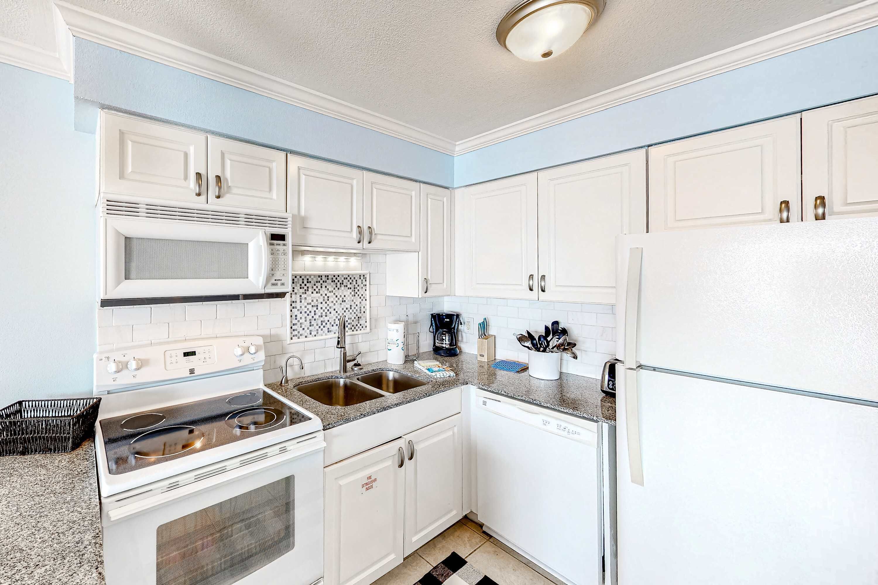 Coffee/tea maker, fridge, microwave, oven