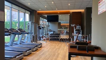 Apartamento superluxo, vista para a cidade | Sala de fitness