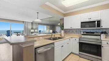 Coffee/tea maker, fridge, microwave, oven